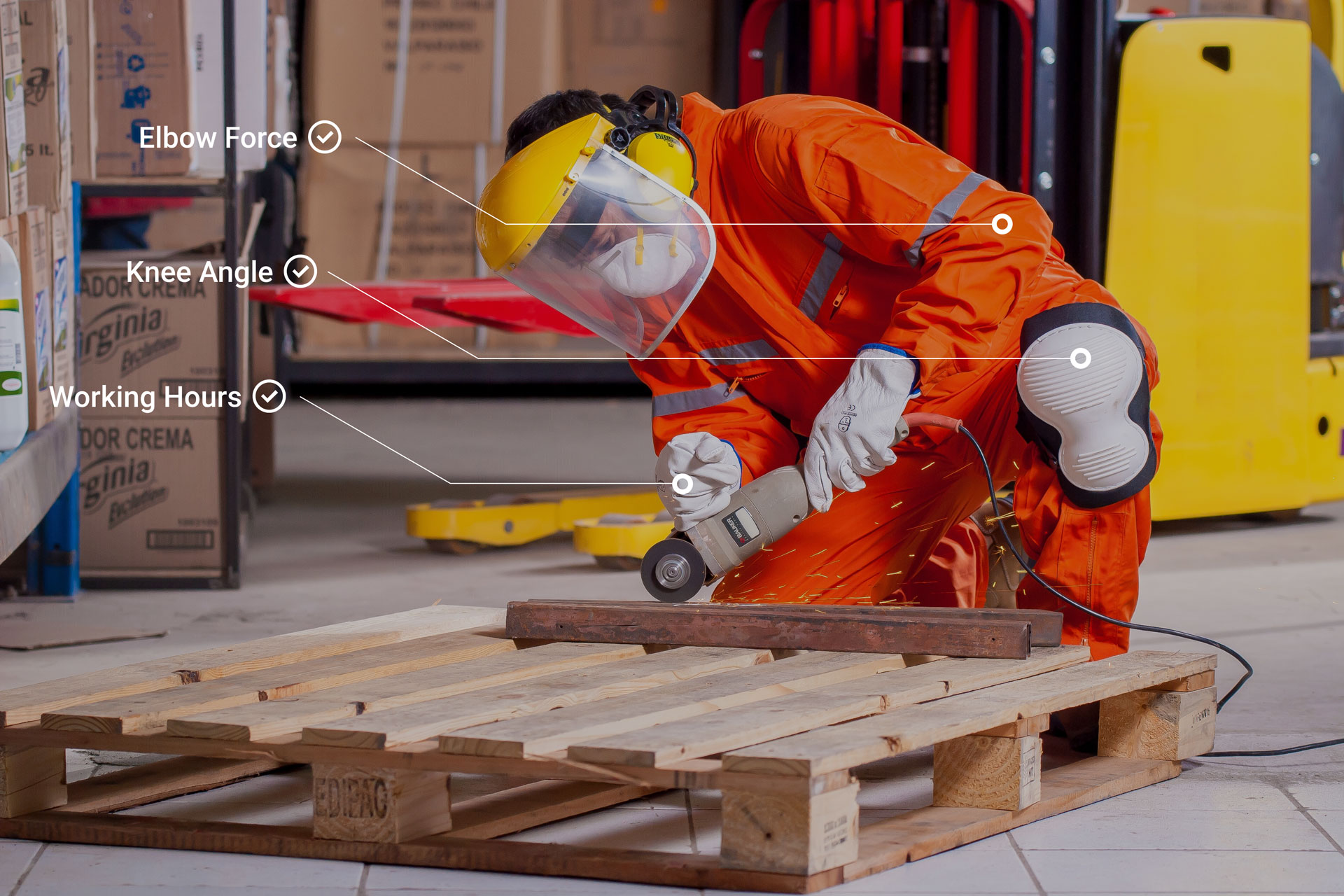 A worker is kneeling down on ground and cutting a steel beam by electric saw.